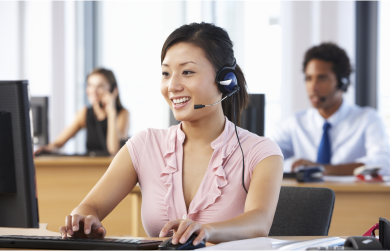 smiling-female-customer-service-rep-wearing-headset-call-center